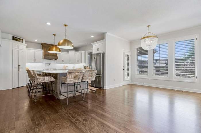 Kitchen remodeling project in Kansas City featuring open layout and oversized island